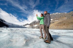 Two people at Columbia Icefield Glacier 